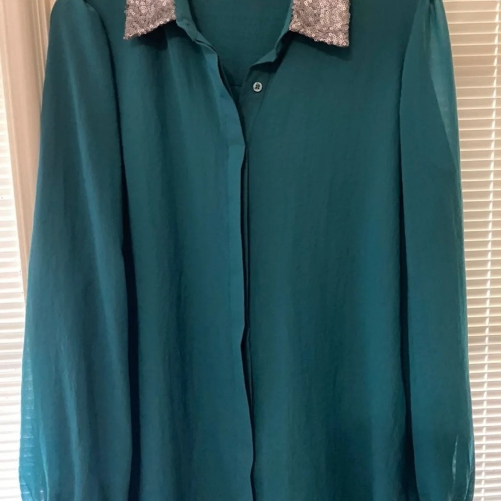 Nice green color blouse for any occasion
